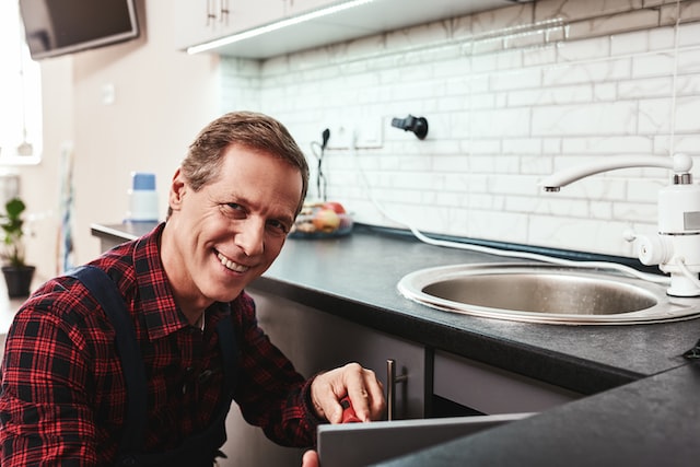 plumber in the kitchen