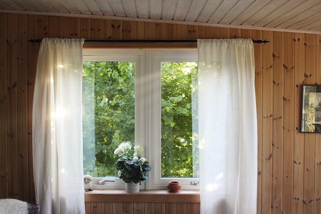 window with white curtains