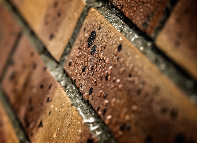 water drops on a brick wall