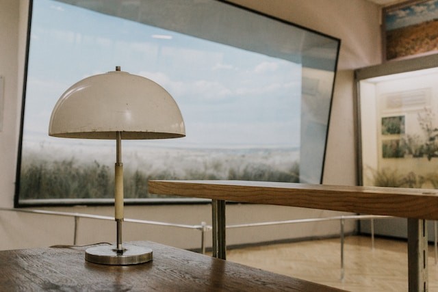 beige small floor lamp on the table