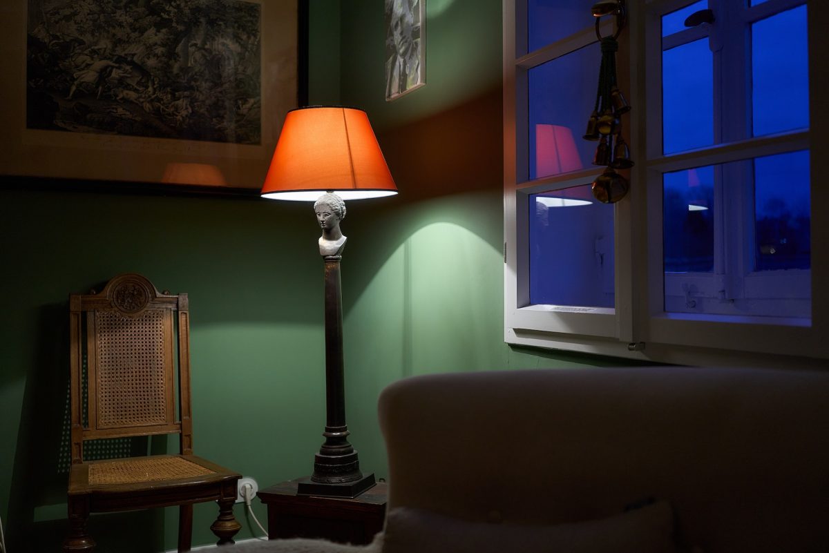 orange floor lamp on the table