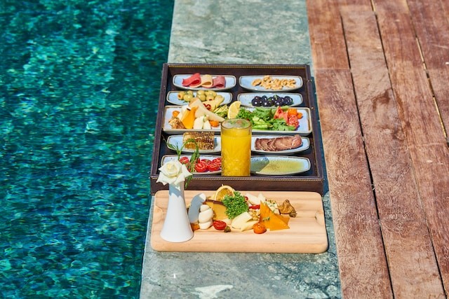 assorted food near the pool