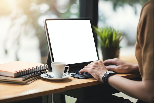 person working in laptop