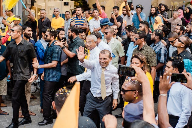 man-waving-to-the-people