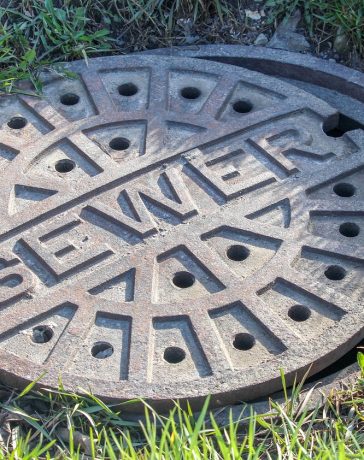 sewer-grass-old-outdoors-round