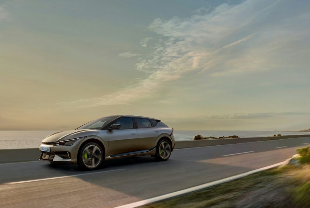 Kia EV6 GT driving along the seashore