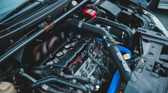 black-and-blue-car-engine-bay